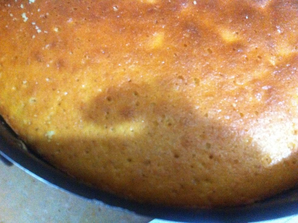 Baked. A little over browned Cz I took it out a little late. but that won't matter since you're gonna cover it with mousse. Let it cool