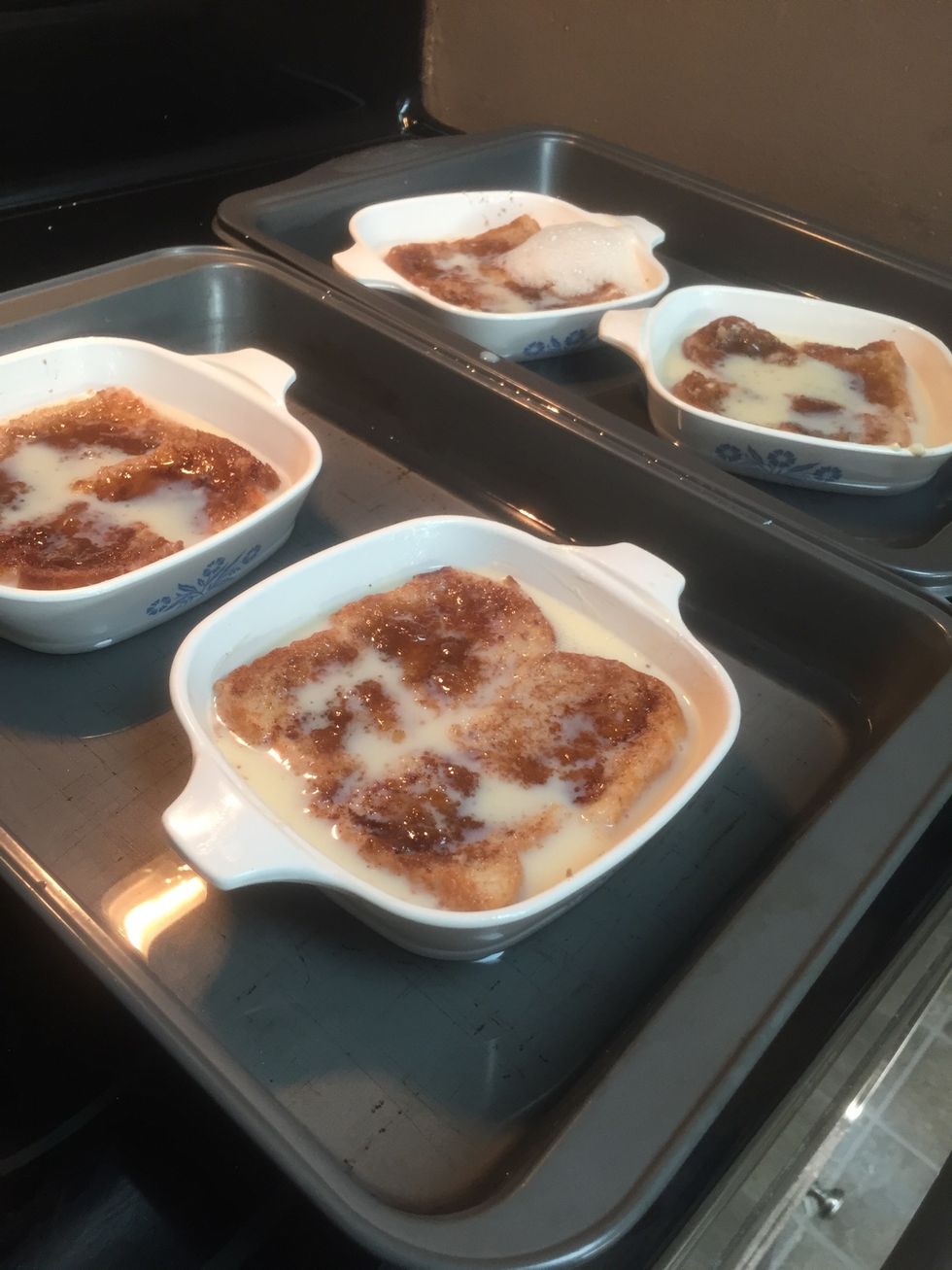 Baking dishes will have to be set into a larger pan which is then filled with hot water to about 1/2" from top of baking dish.