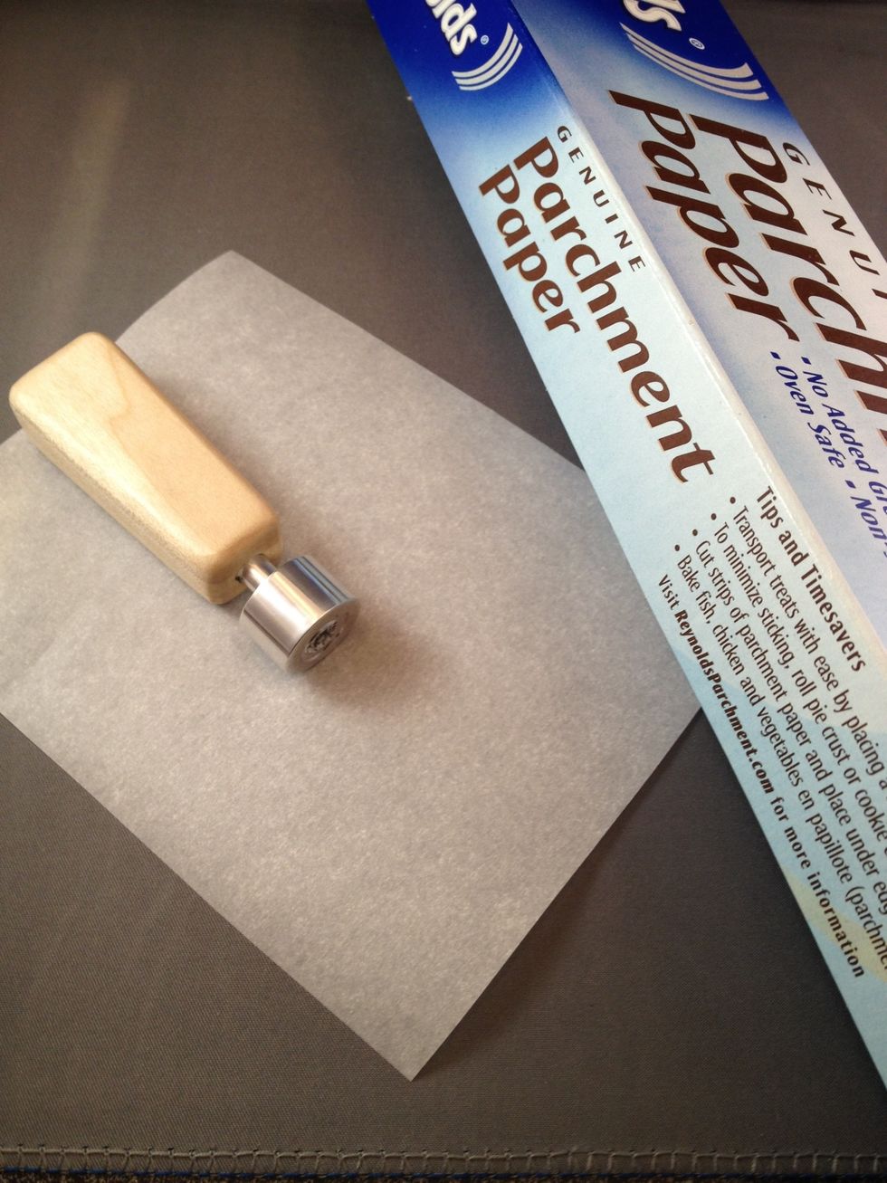 Baking parchment is a good surface for creating seals to peel up and add double faced adhesive to.