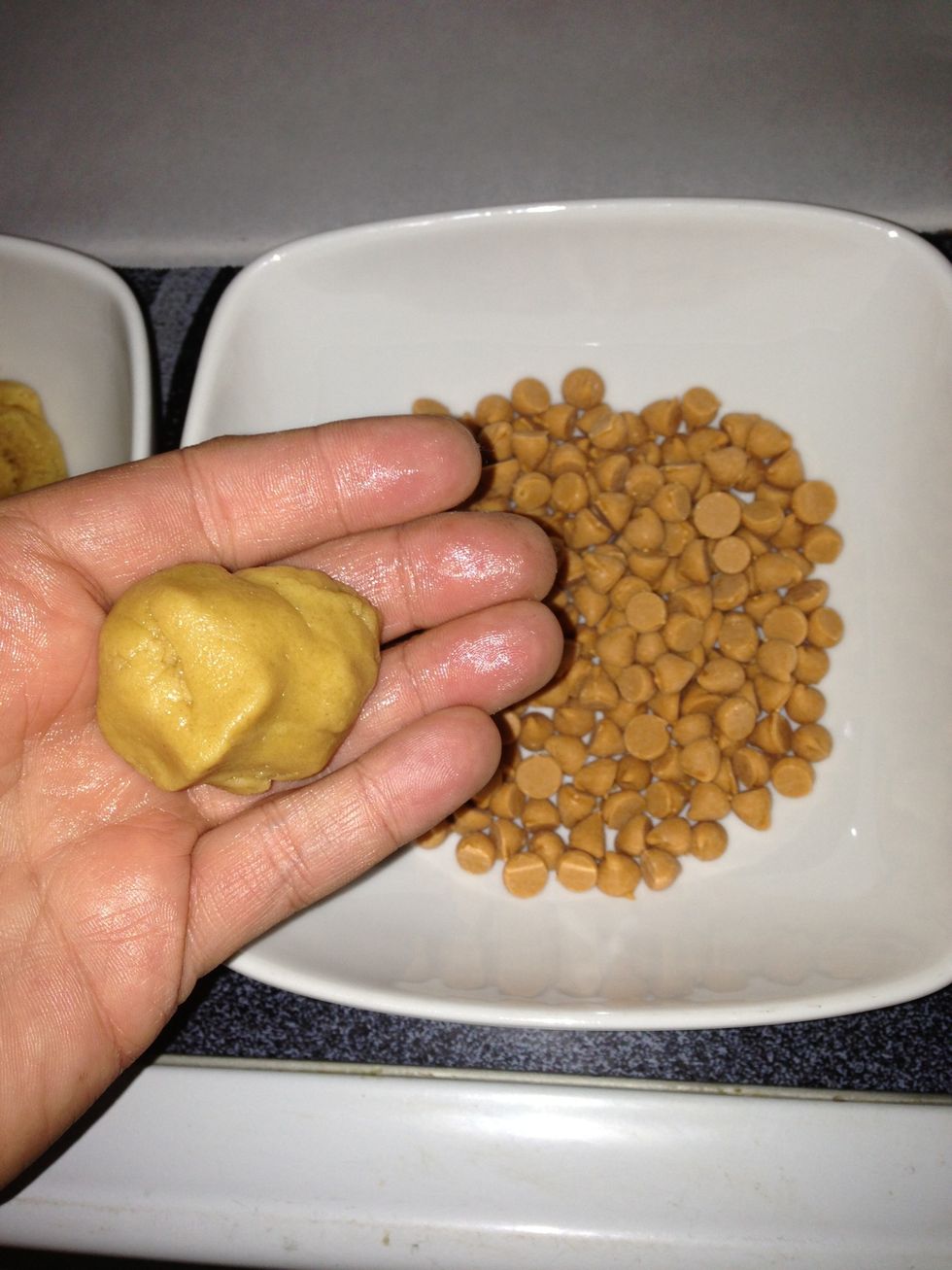 Ball some dough up just enough for a cookie. Who cares how much. People will gobble them up big or small or funky shaped. Relax. Do your thing. :)