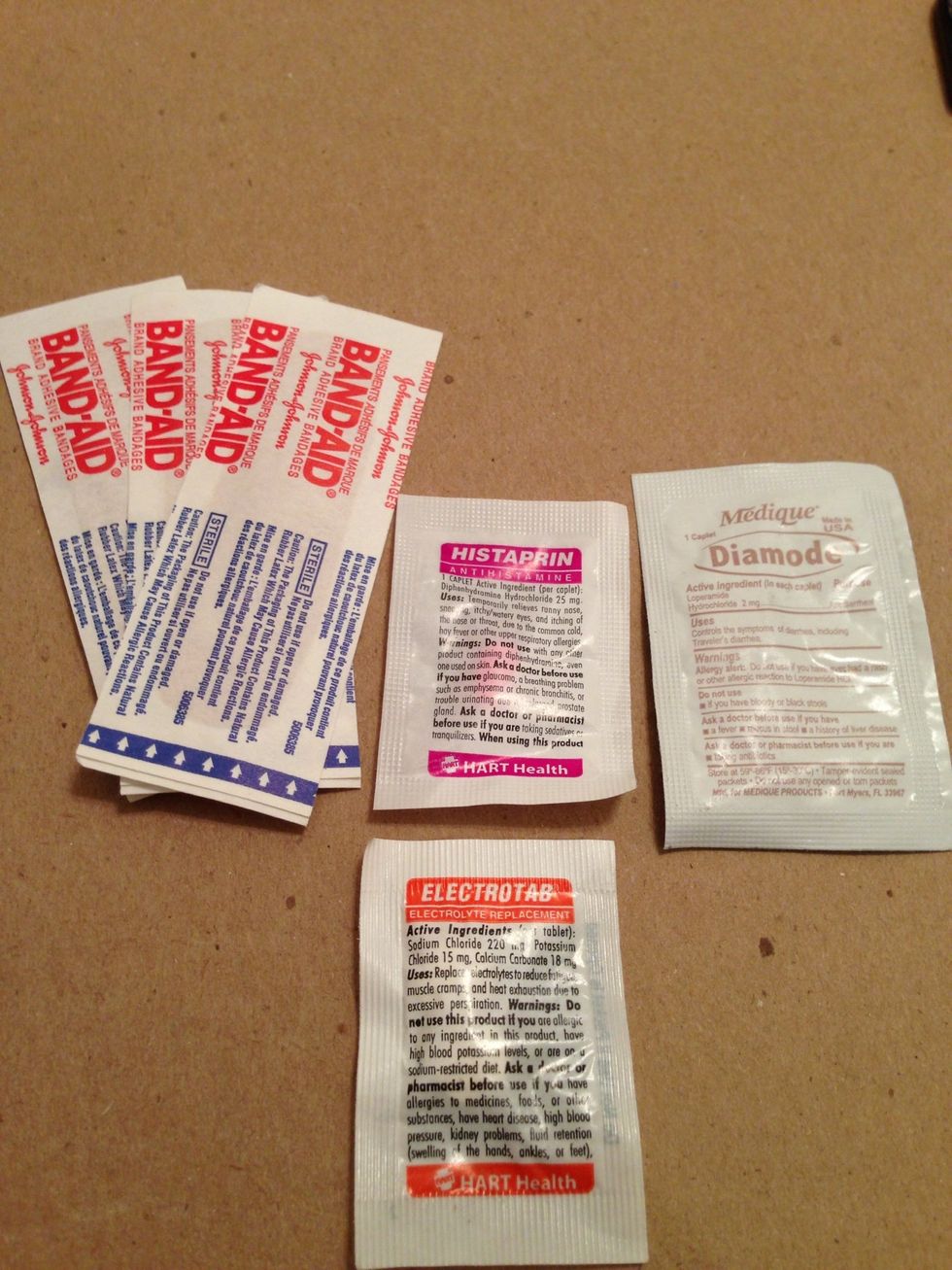 Band-aid, Anti-diarrheal, antibiotic, antihistamine. (Pre-made packs are sold, but go to Costco and buy them all for less than $20.00)