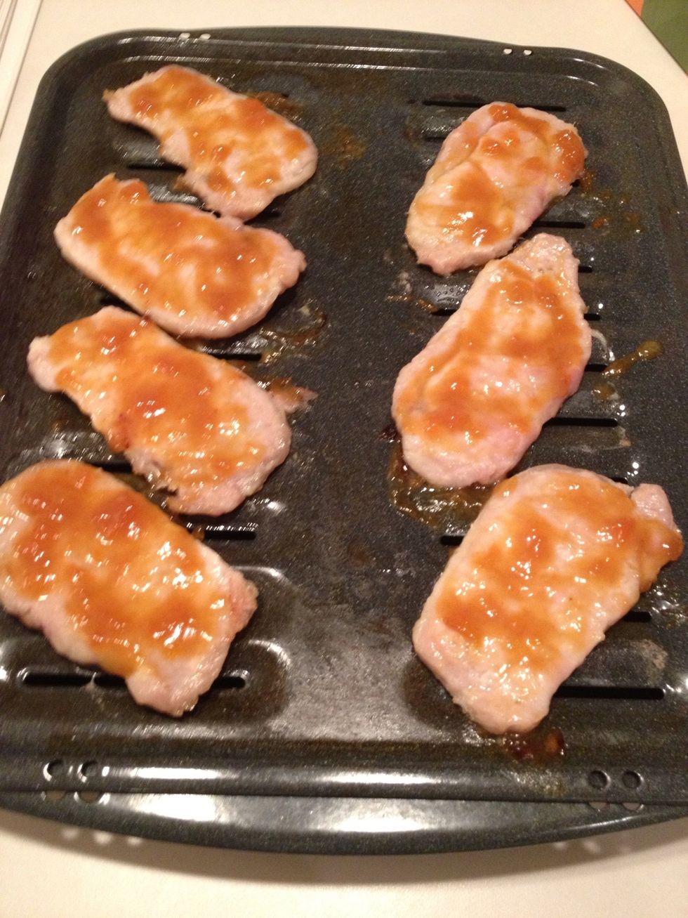 Baste the flipped side of your pork with remaining sauce. Return pork to the oven and broil for an additional 5-7 minutes until sauce starts to brown.
