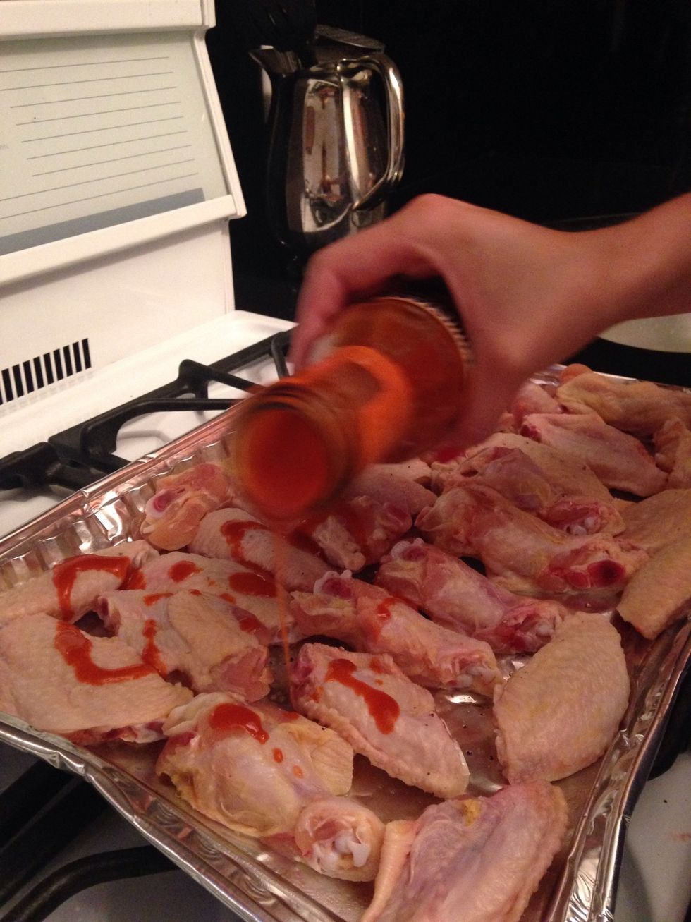 Baste the wings fully in sauce