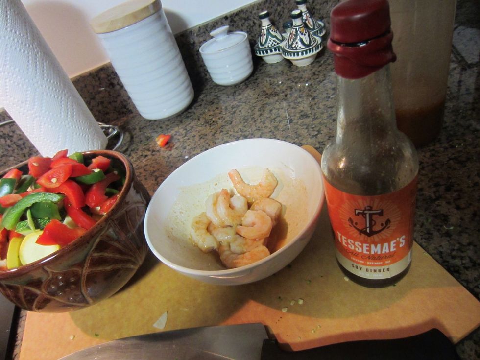 Bathe shrimp in Tessemae's Soy Ginger dressing. They love it.