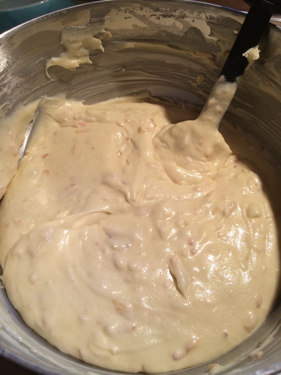 Batter is ready for the prepared cake pan.