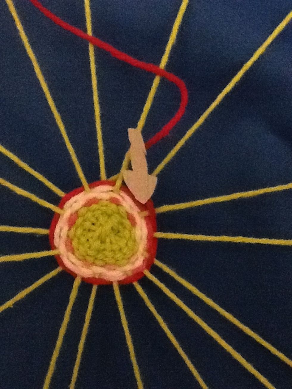 Be careful to go over and under continuously. Here you see a step was missed and two strings are both under. Pull out the yarn to where the mistake is and start over from that point if this happens.