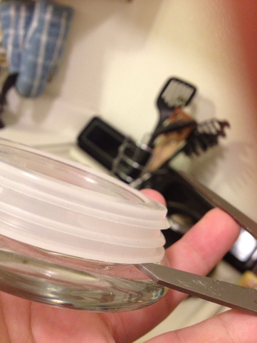 **BE CAUTIOUS** Be careful holding the glass lid while slipping your scissor tip under the plastic. Make sure to point the scissor away from fingers and face \ud83d\ude18