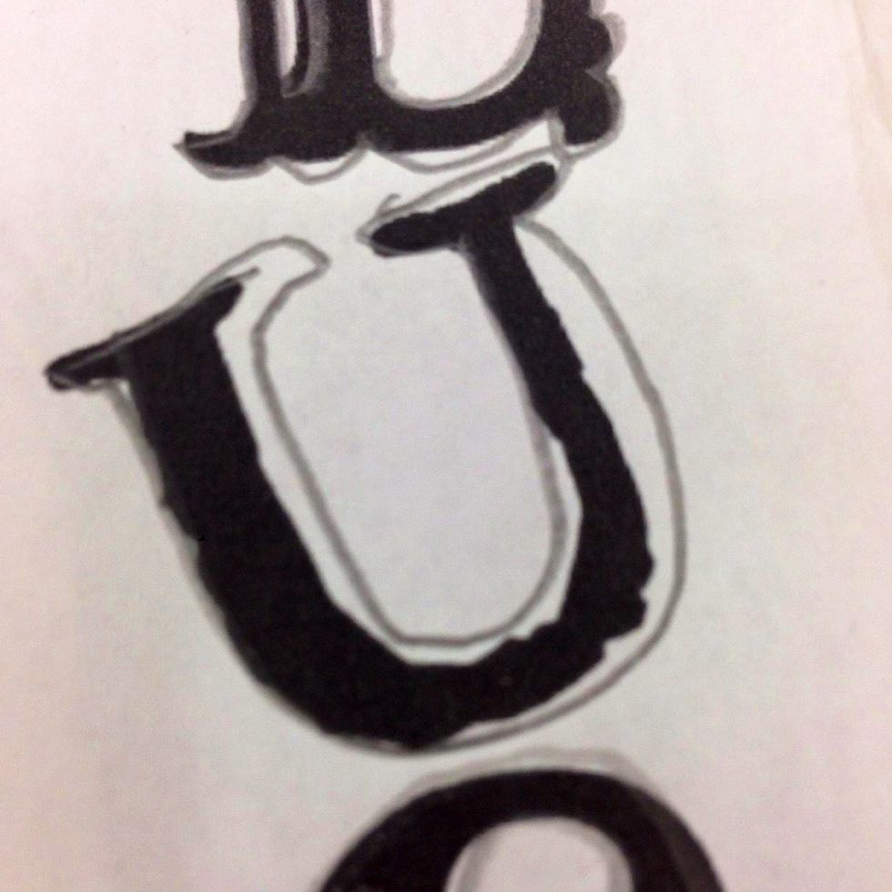 Be creative tracing the 'U'. Widen and curve the vertical sections of the letter so it looks more like a horse shoe.