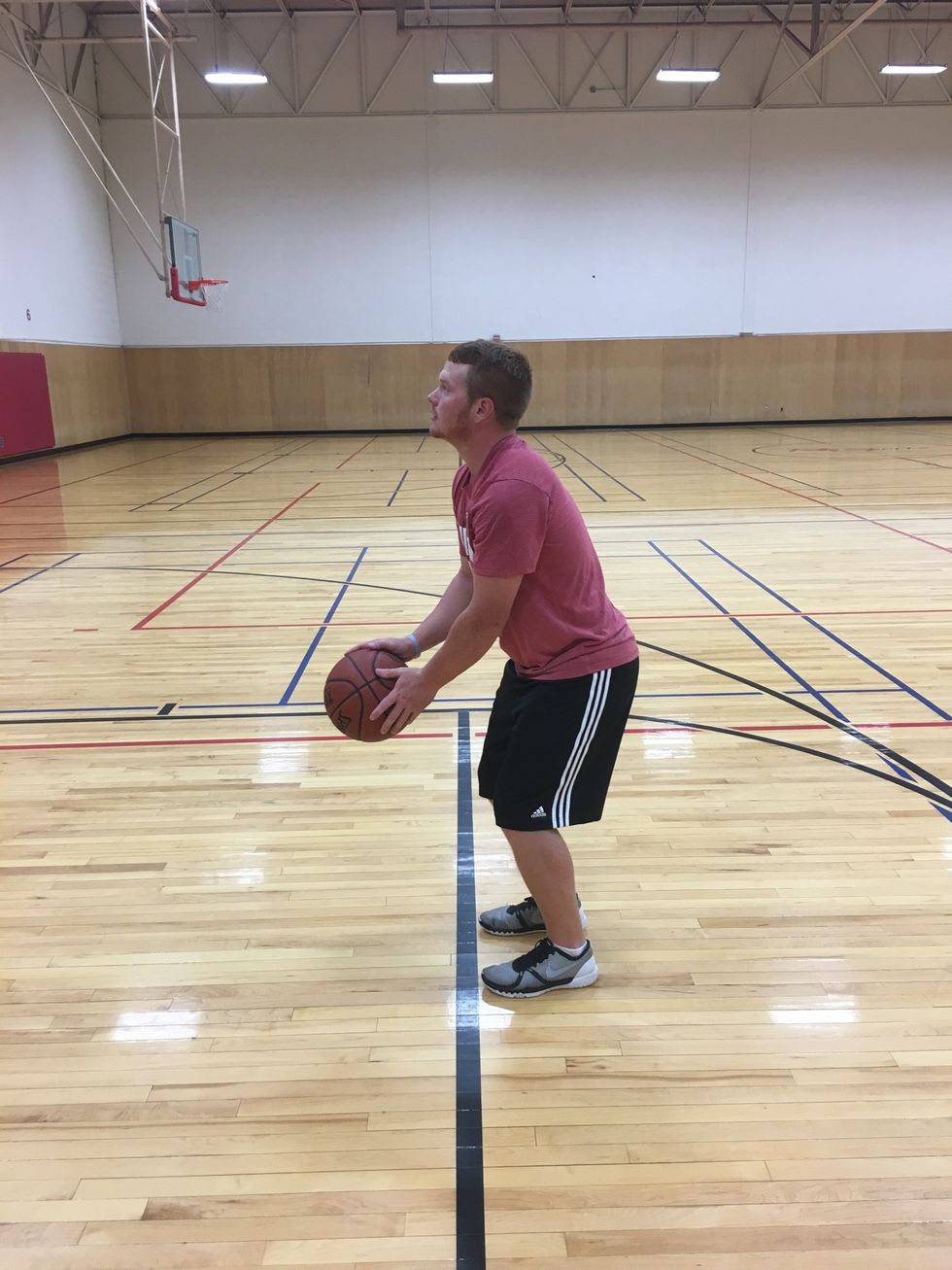 Be in athletic stance. Eyes on the hoop. Hold ball in shooting ready position