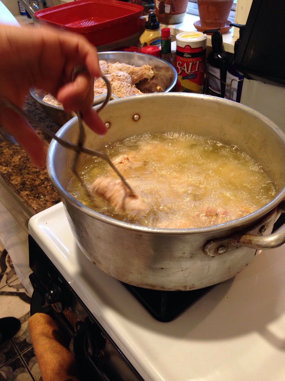 Be really careful because this oil is piping hot. I would recommend wearing long sleeves and keeping small children away at this stage.