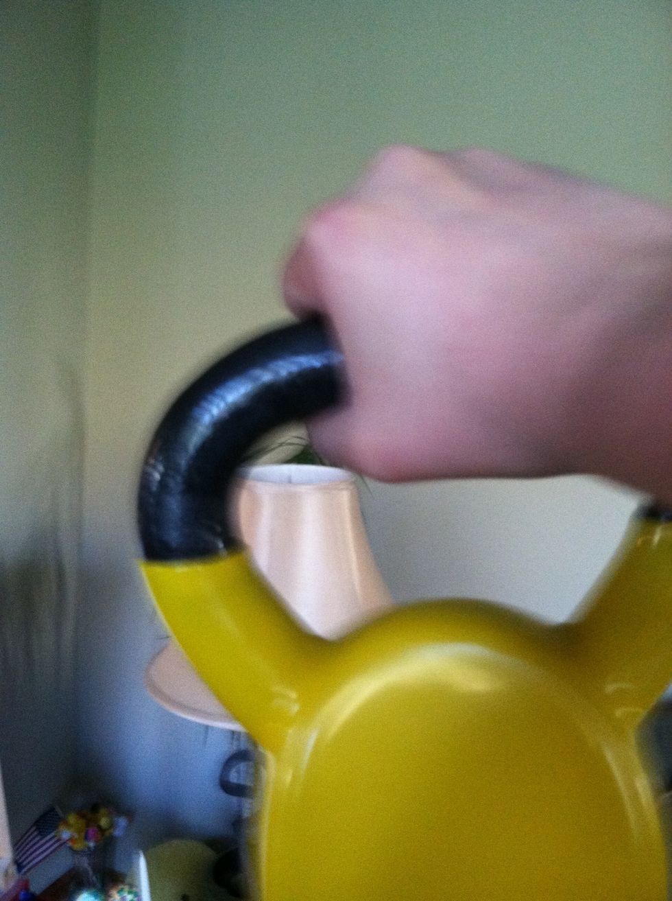 Be sure not to hold the bell like this. It can harm your wrist. Always keep it held out like in the previous step.