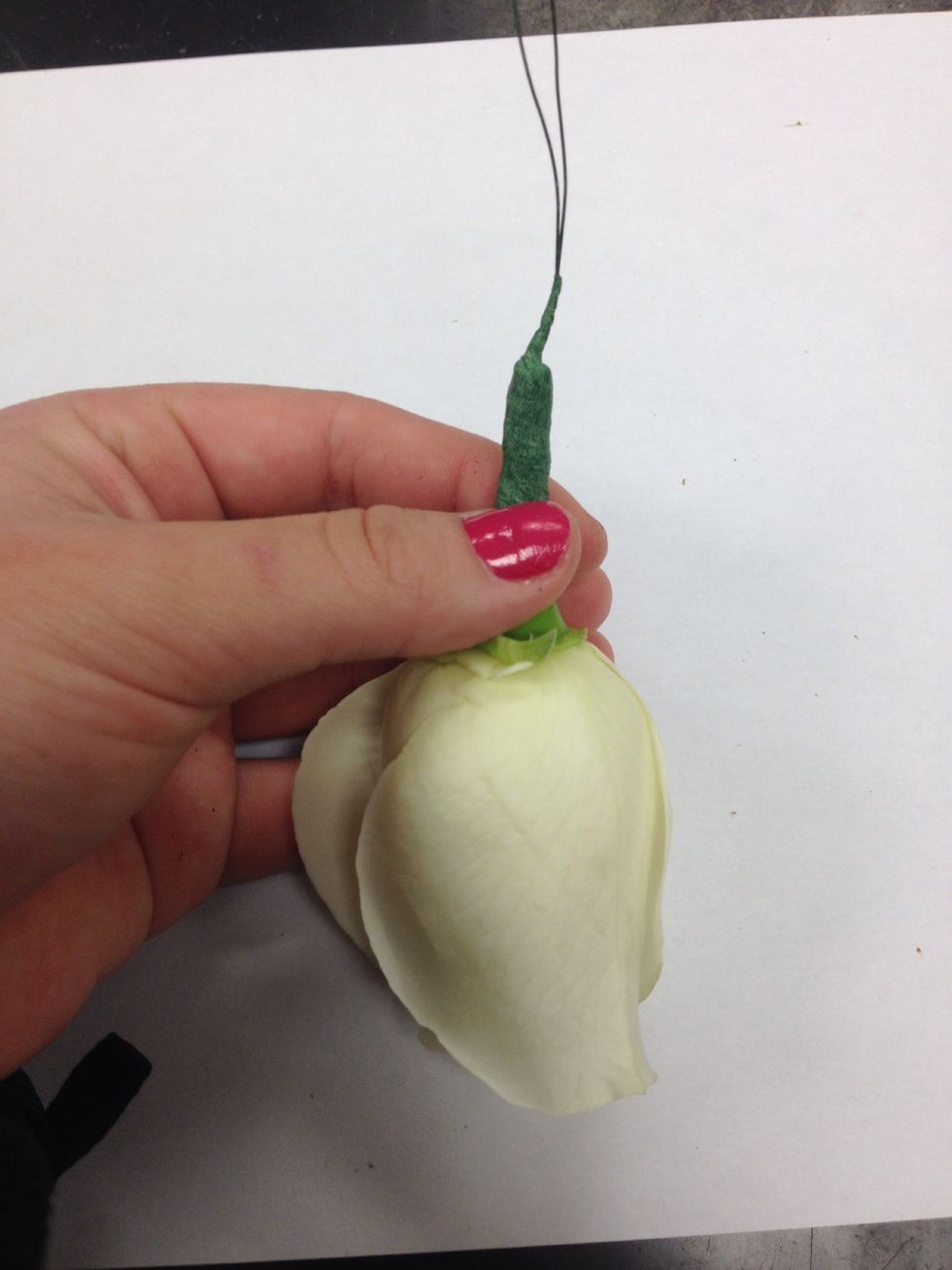 Be sure to extend floral tape slightly beyond the end of the stem, making sure that the edge of the stem is sealed.