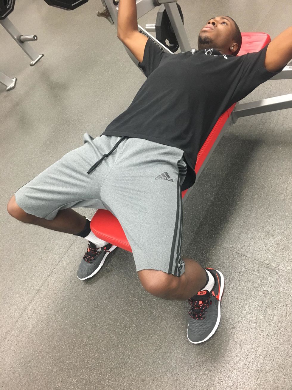 Be sure to firmly plant your feet while benching