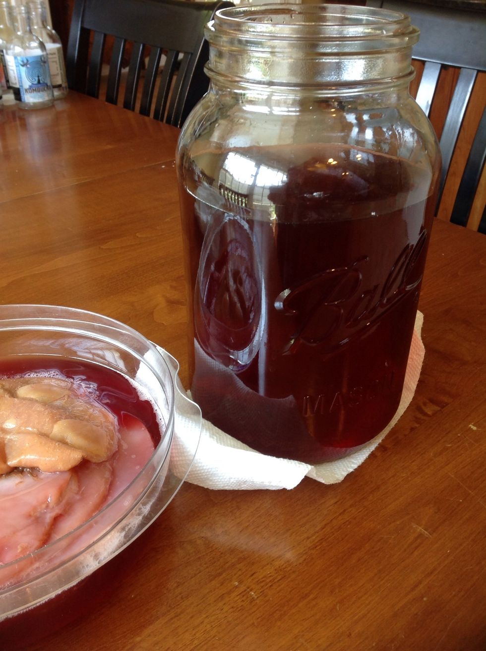 Be sure to save some kombucha to store your SCOBY in until your next brew. You will grow a new SCOBY with each brew. SCOBYs can be given away or put in a container covered with a cloth.