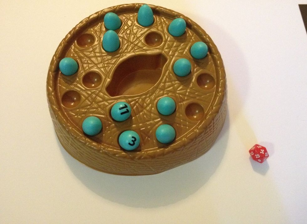 Be sure to teach the learner to leave the egg in the nest with the number side up for the duration of their turn (instead of removing it from the nest.)