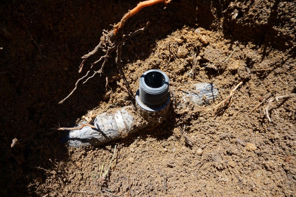 Be very careful not to let dirt get in to the fitting. It could block the heads from getting enough water. You can take the heads apart and flush the lines, so it's not the end of the world.