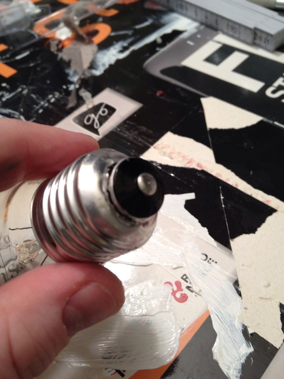 Be very careful!! Remove the loose part. Its a wire inside, so You have to pull a bit hard, but dont squeeze the bulb!!!