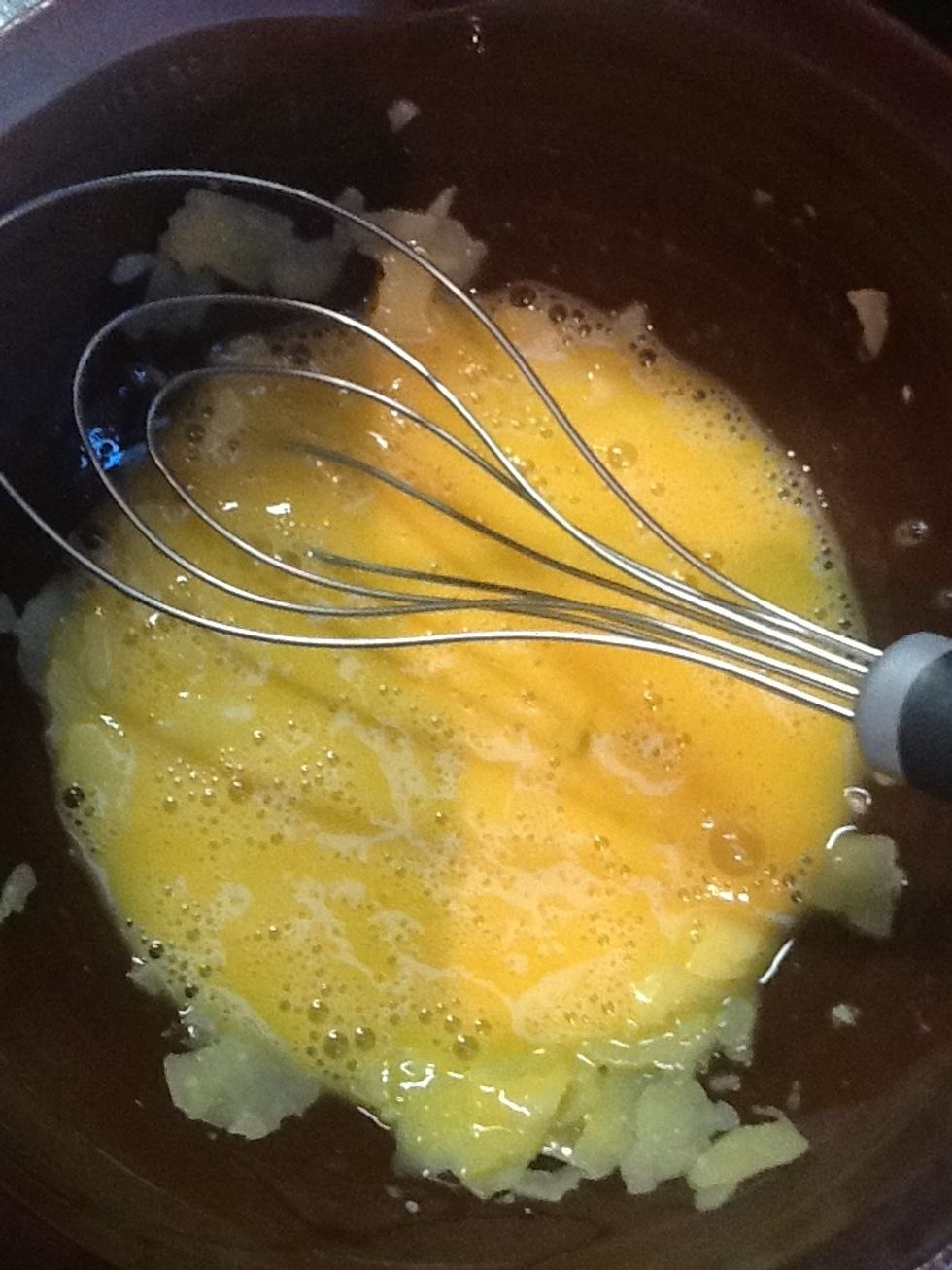Beat cheese and egg in a bowl