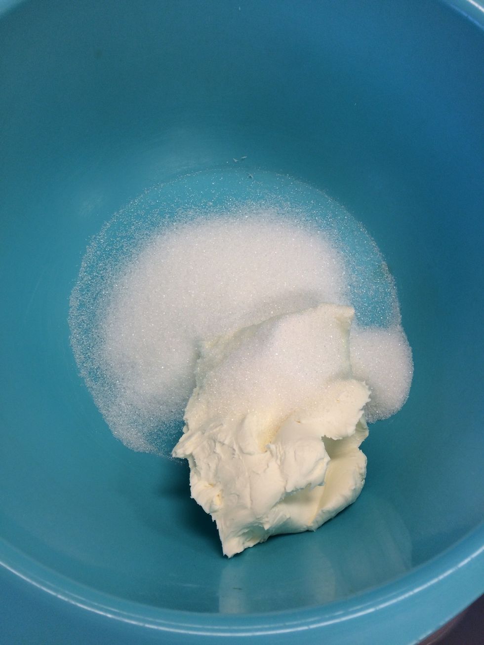 Beat cream cheese and 1/3 cup sugar with an electric mixer until smooth