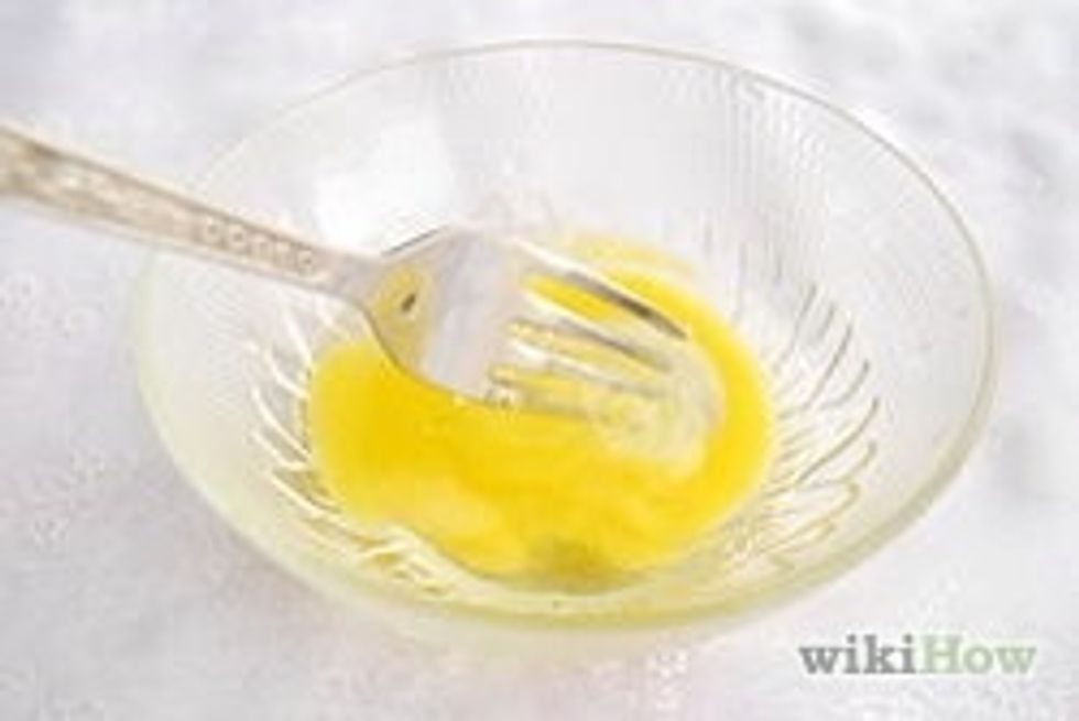 Beat egg in a bowl.