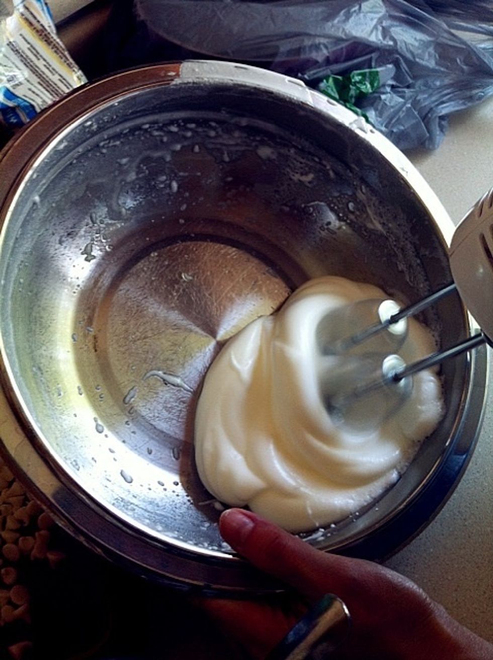 Beat egg white on high speed in electric mixer until pale and foamy. Do not overbeat.
