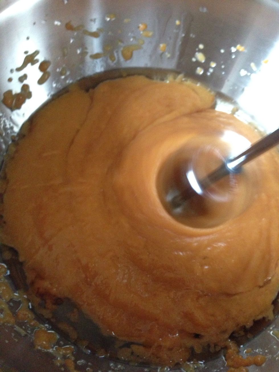 Beat eggs, sugar, canola oil, and pumpkin until smooth and fluffy.