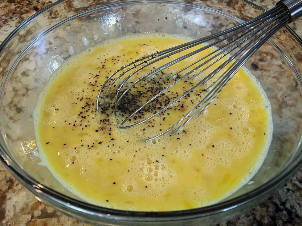 Beat eggs with or without milk and salt and pepper.