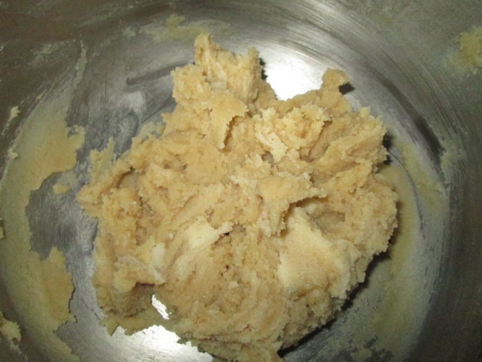 Beat in both sugars a little at a time until it is light and fluffy.