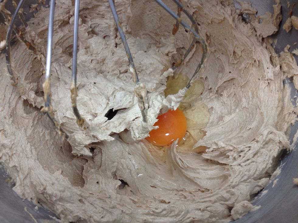 Beat in the egg and vanilla extract.