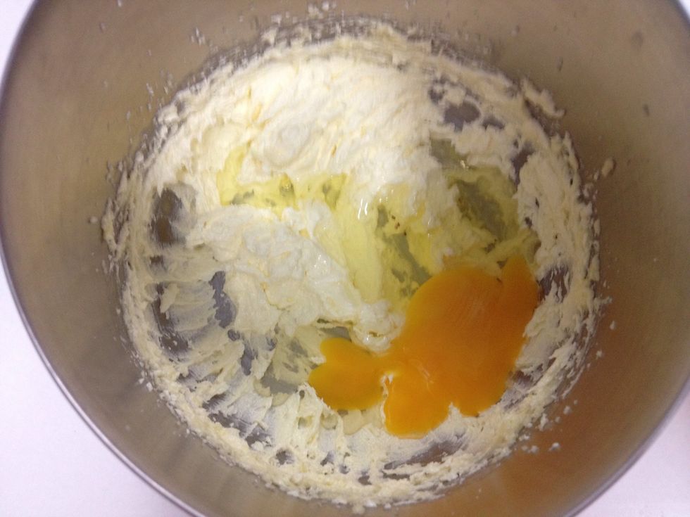 Beat in the egg.