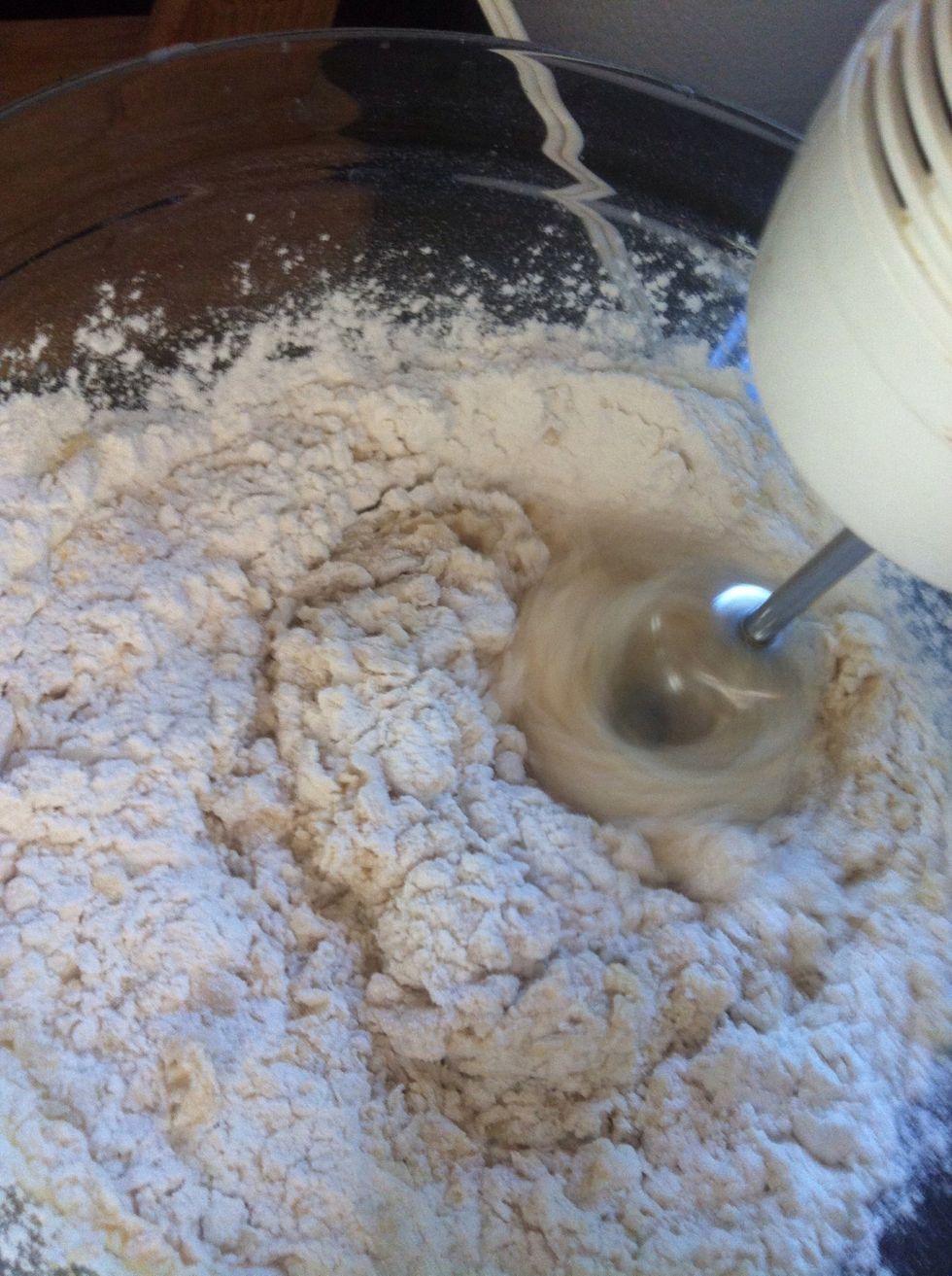 Beat on low for 30 seconds, scraping the bowl. Then beat on medium for 2 min occasionally scraping.