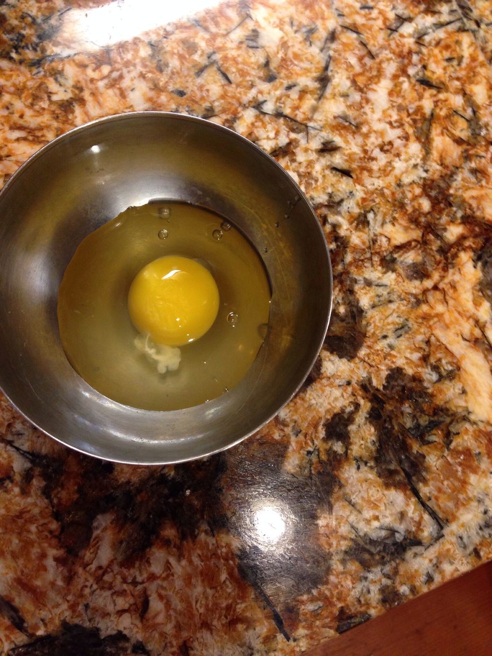 Beat one egg in a small bowl.