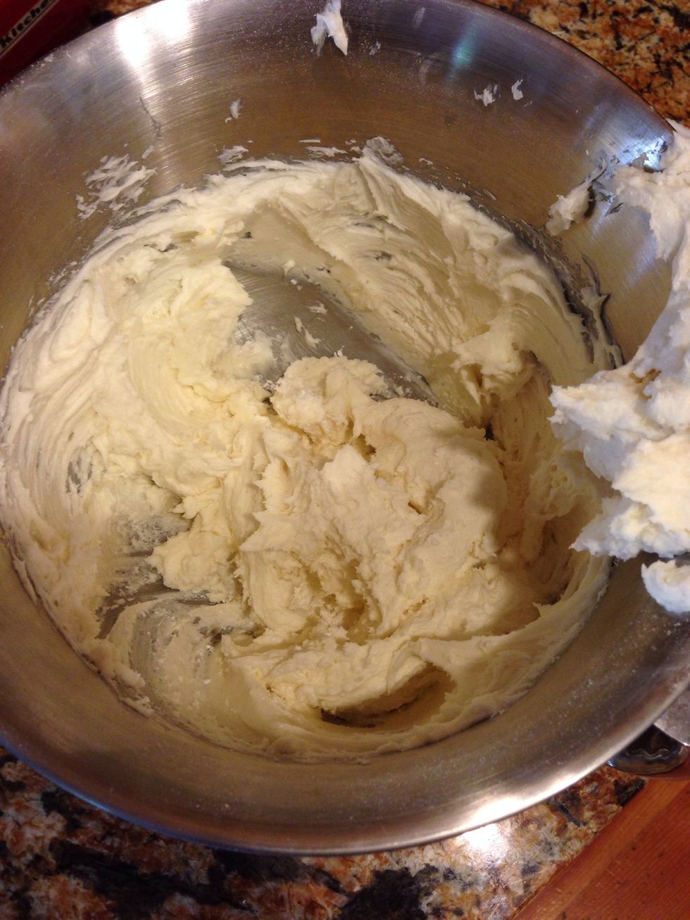 Beat room temperature butter, cream cheese, and shortening, slowly add salt, vanilla extract, and powdered sugar cup by cup.