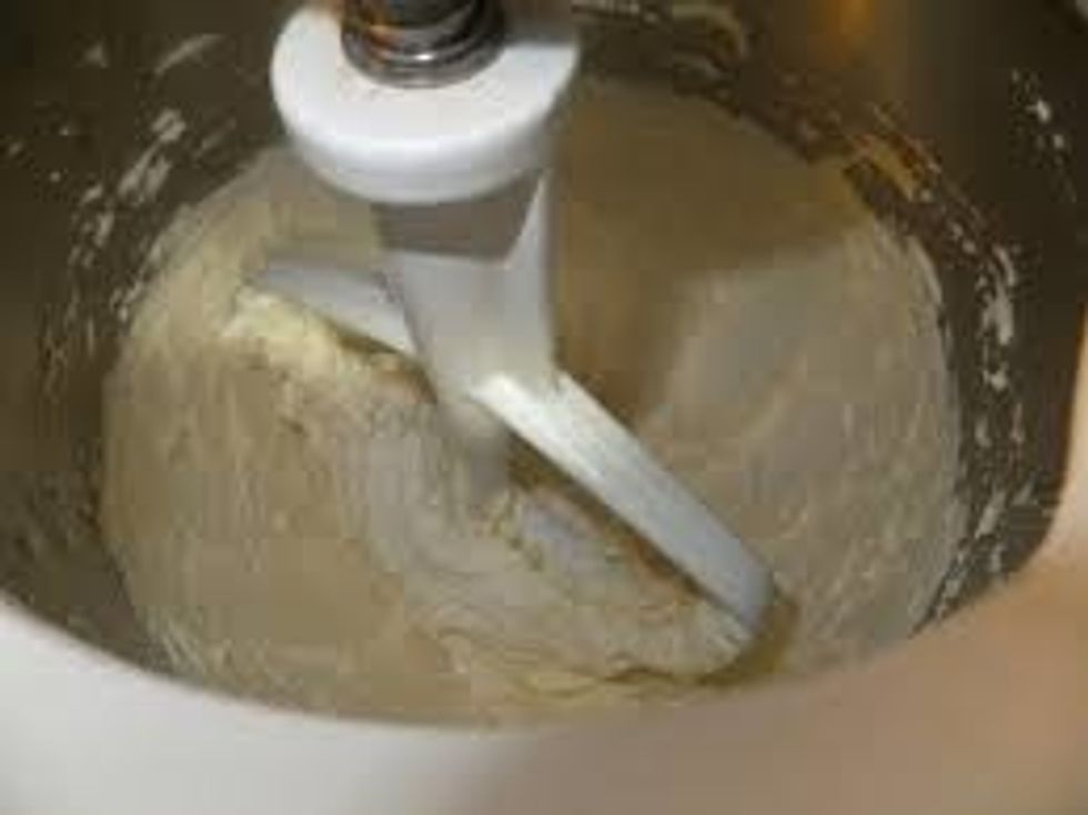 Beat softened butter and cream cheese until well blended