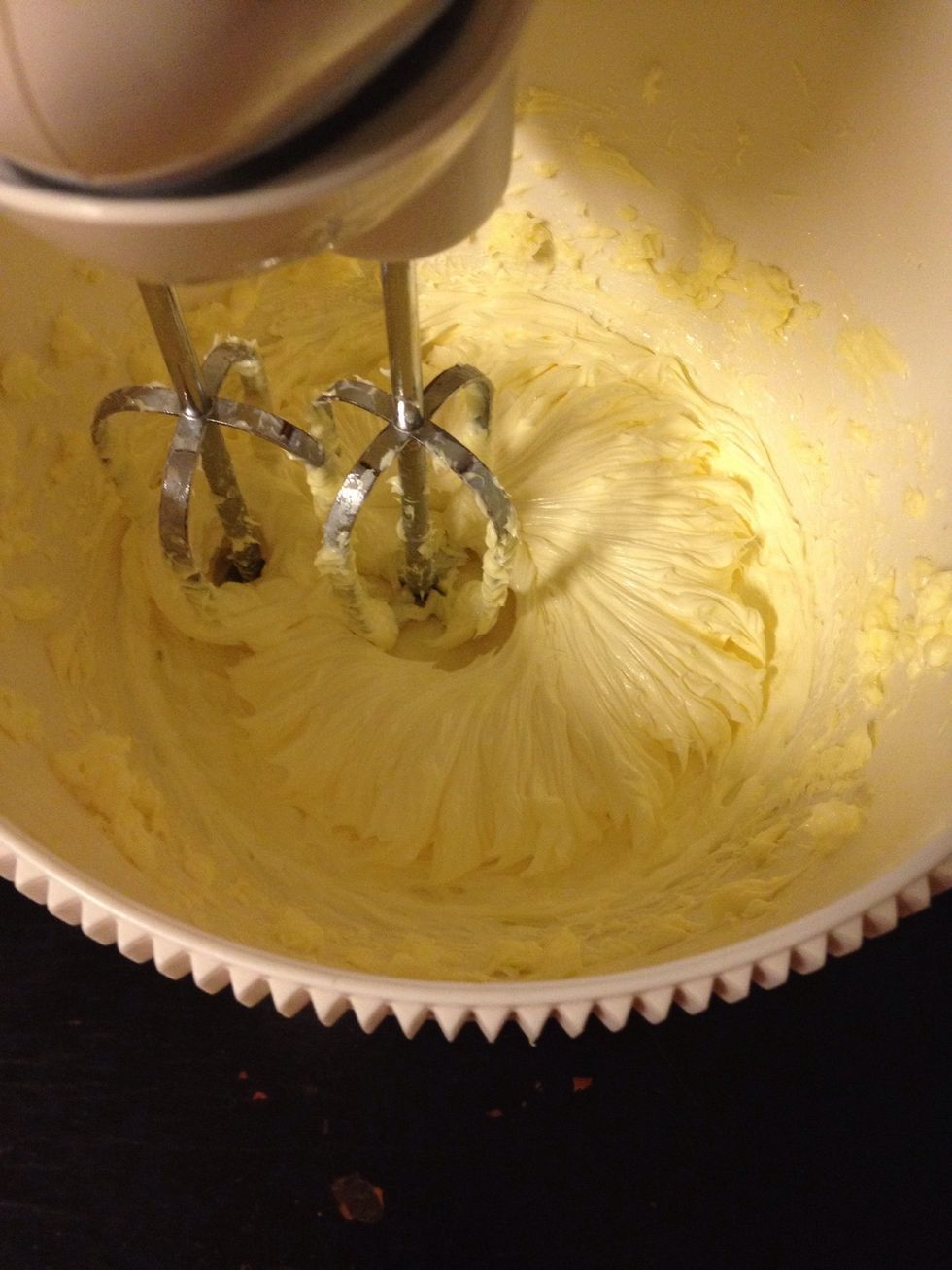 Beat softened butter until creamy then add in both sugars, vanilla, water and salt. Beat until creamy and smooth.
