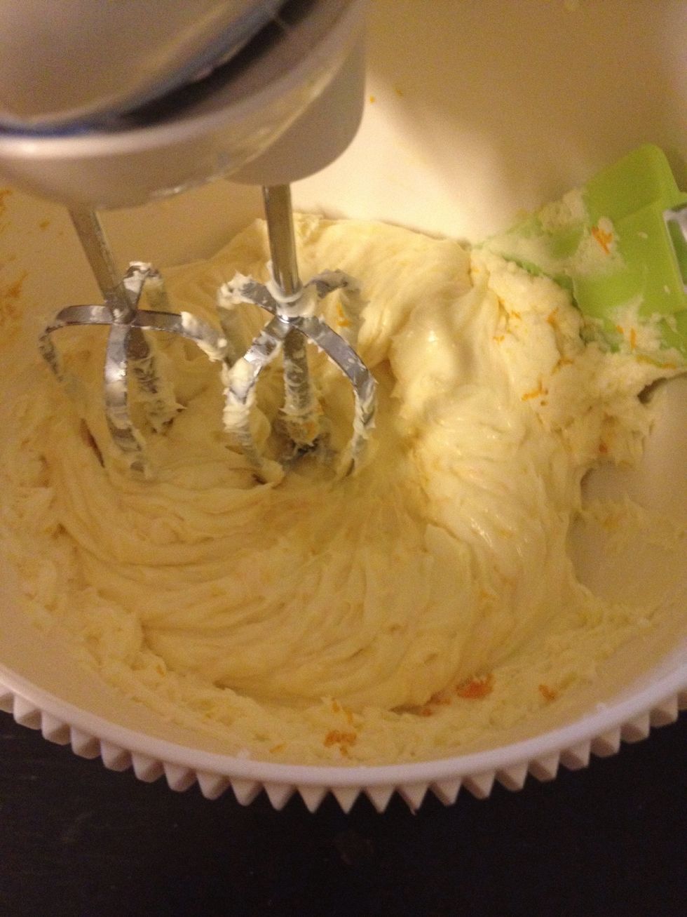 Beat softened cream cheese with sugar until smooth. Add in the orange zest and mix till incorporated.