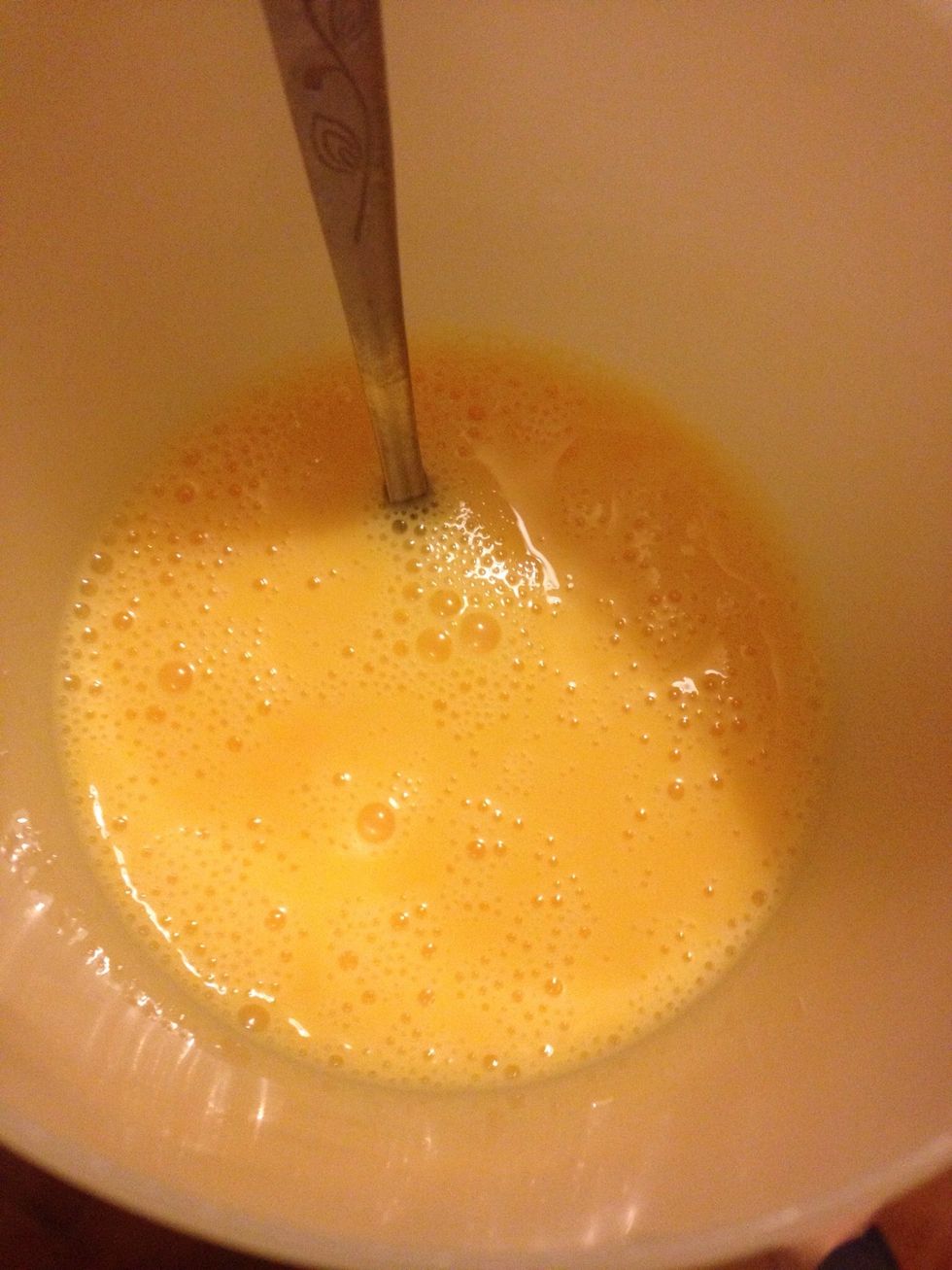 Beat the 4 whole eggs together with the milk.