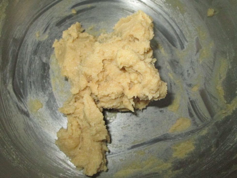 Beat the butter and both sugars together with an electric mixer in a large bowl until smooth.