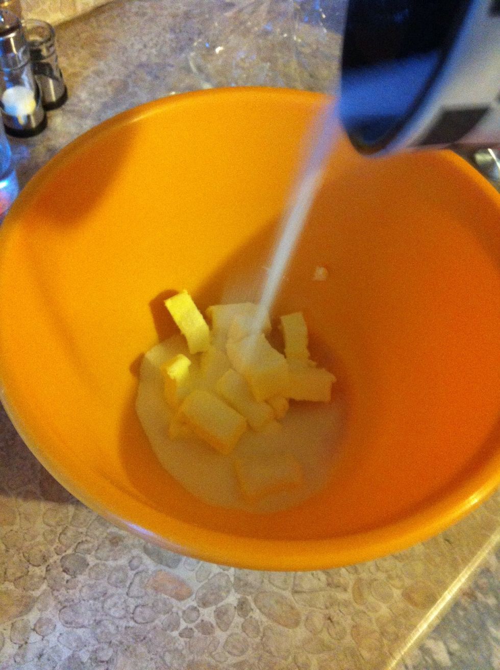Beat the butter in the bowl until the mixture is light and fluffy.