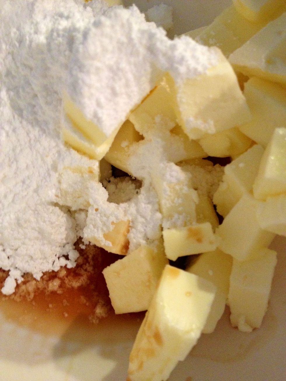 Beat the butter, sugar, and vanilla on medium speed until creamy.