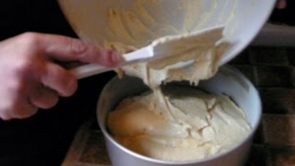 Beat the cake batter with an electric beater on the high setting for about 3 minutes.  It will turn a pale shade of yellow.  Pour the batter into a greased and floured 8x2 (I use 8x3) inch cake pan.