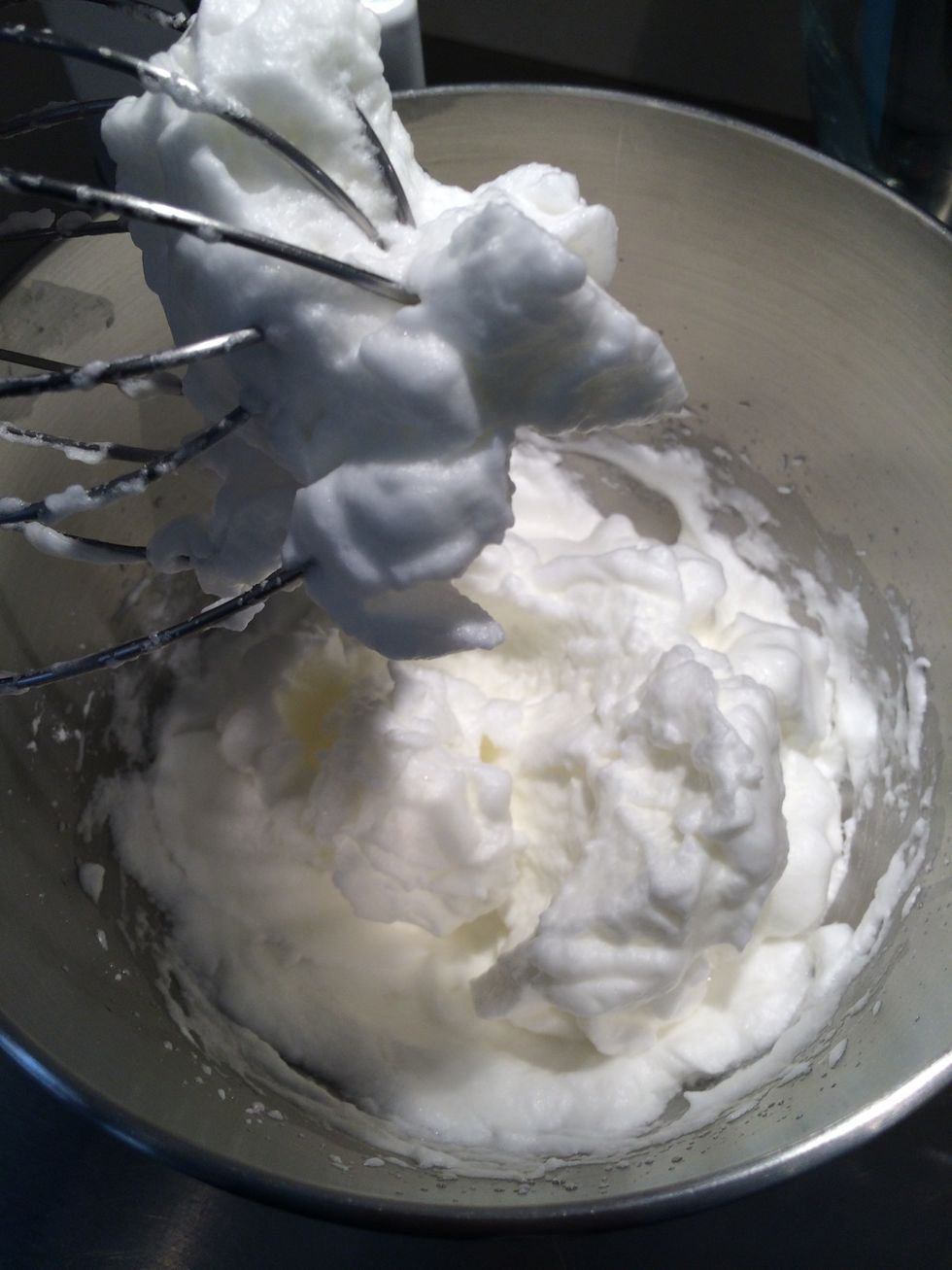Beat the egg whites into peaks