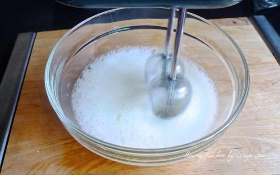 Beat the egg whites till stiff.