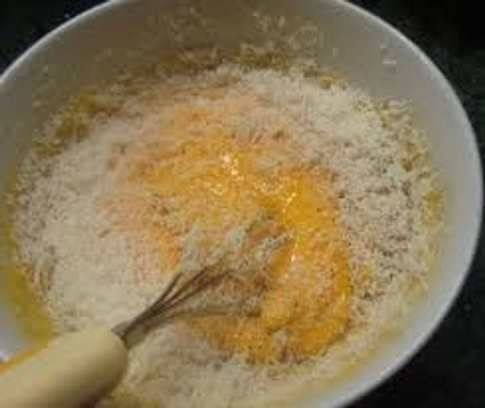 beat the eggs in a bowl with grated pecorino romano cheese