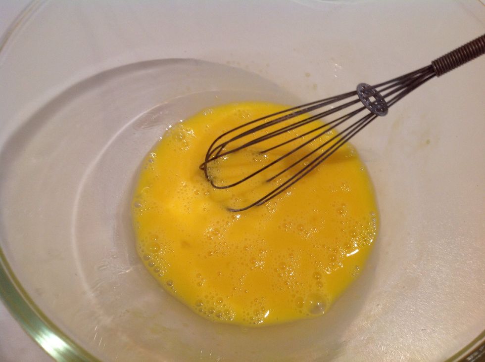 Beat the eggs with a whisk