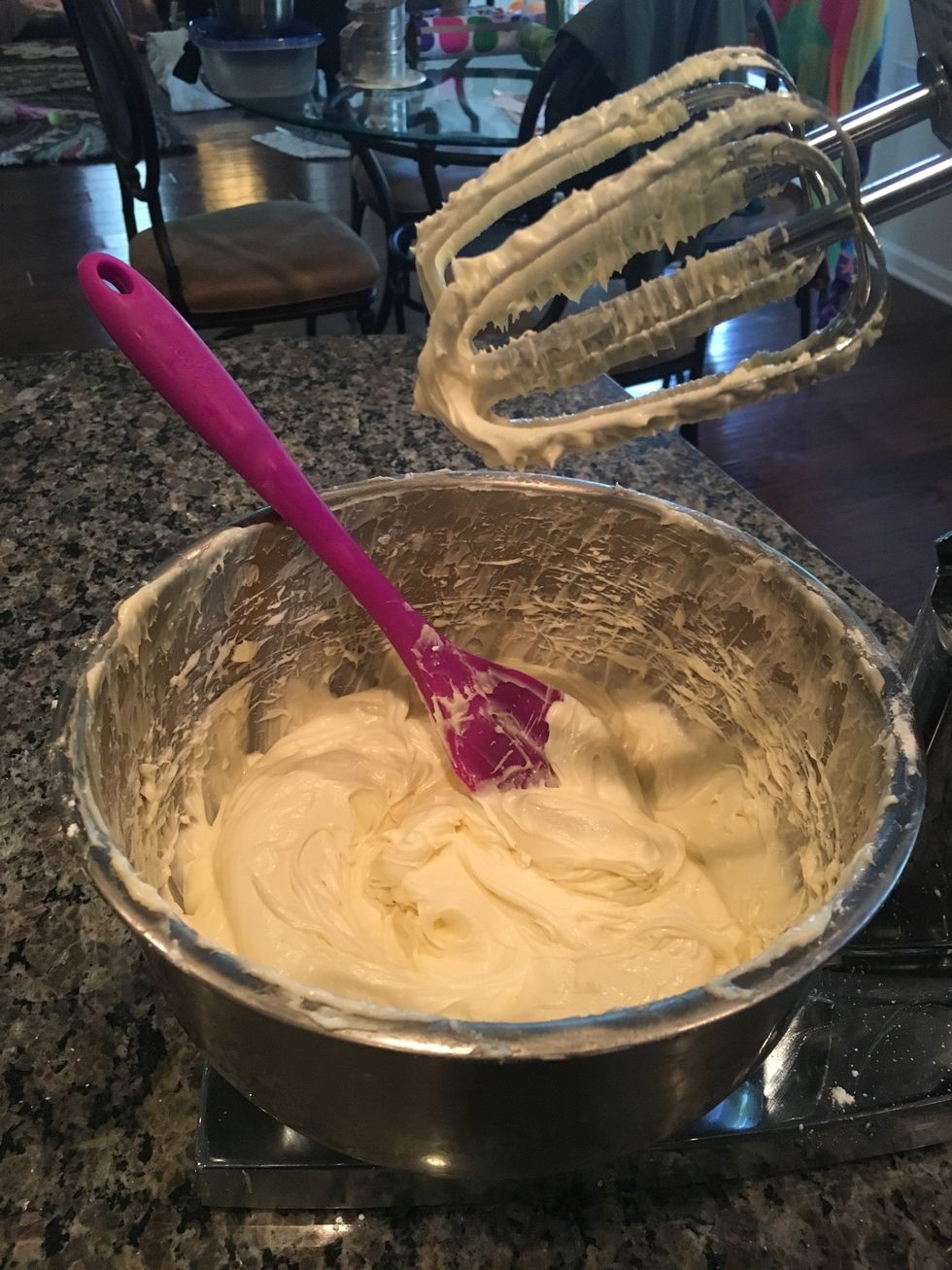 Beat the mixture until it is light and fluffy.
