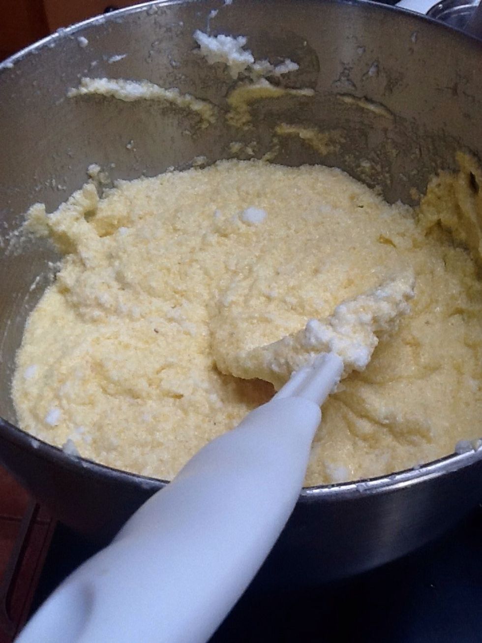 Beat the   sugar , butter , add  the eggs yolks one at time, 2 tbsp flour .1tsp baking power.until cream Add the grind almonds at last the white  fluff eggs. Almond flavour .