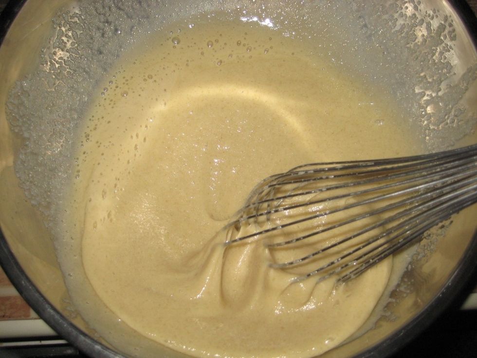 Beat till it's pale in color and thick. It should take about 2-3 minutes depending on whether using an electric mixer or by hand.