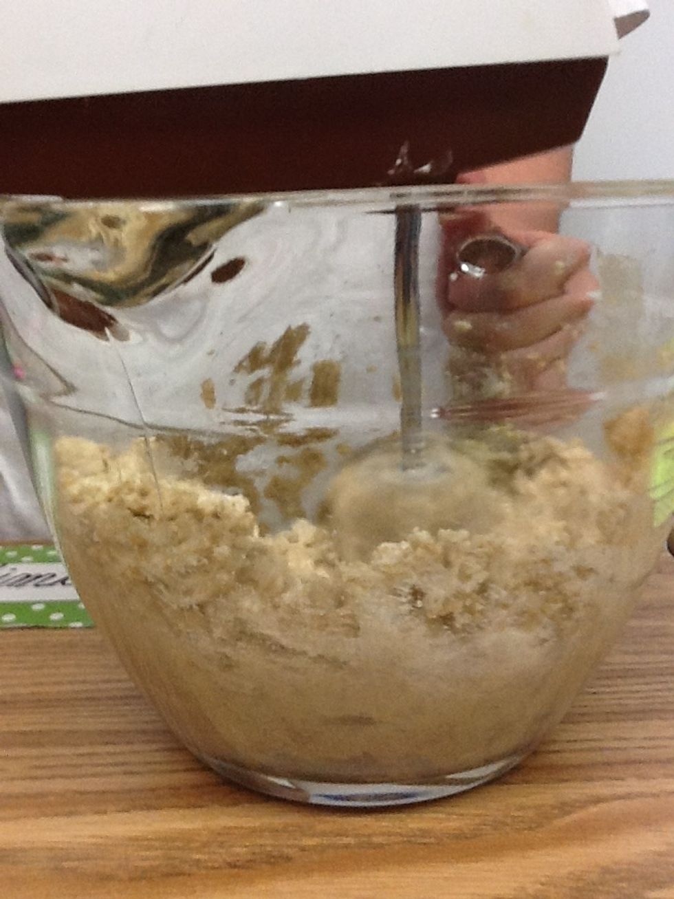 Beat together butter and sugar.