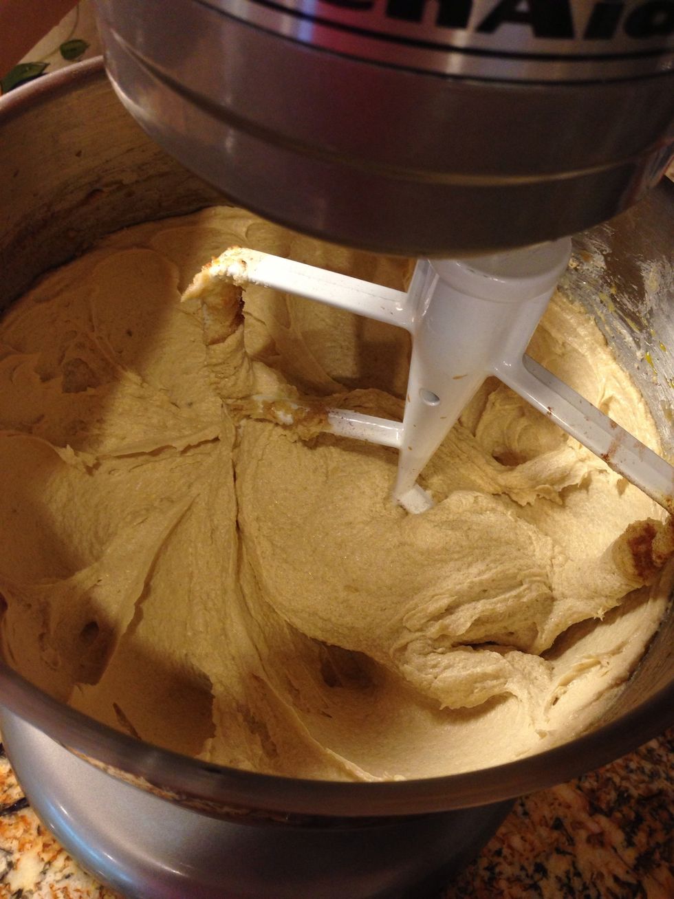 Beat together butter, sugars, eggs, vanilla extract, then mix in flour(with baking soda, baking powder and salt) and sour cream, alternating between the two. Slowly add the rum, and beat well!